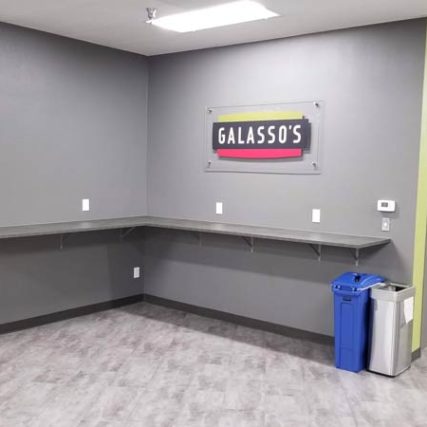 Clear Acrylic Sign with standoffs install by Screamin' Signs & Graphics