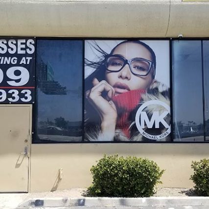 Perforated Vinyl Graphic install by Screamin' Signs & Graphics