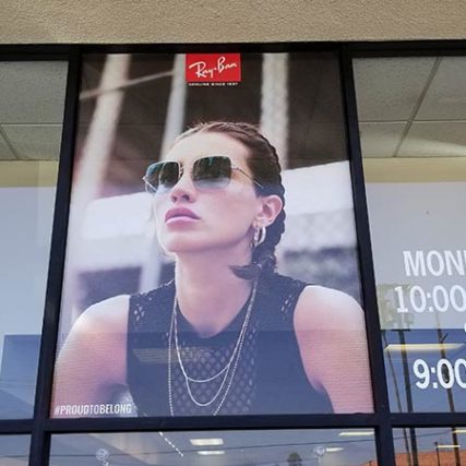 Perforated Vinyl Graphic install by Screamin' Signs & Graphics